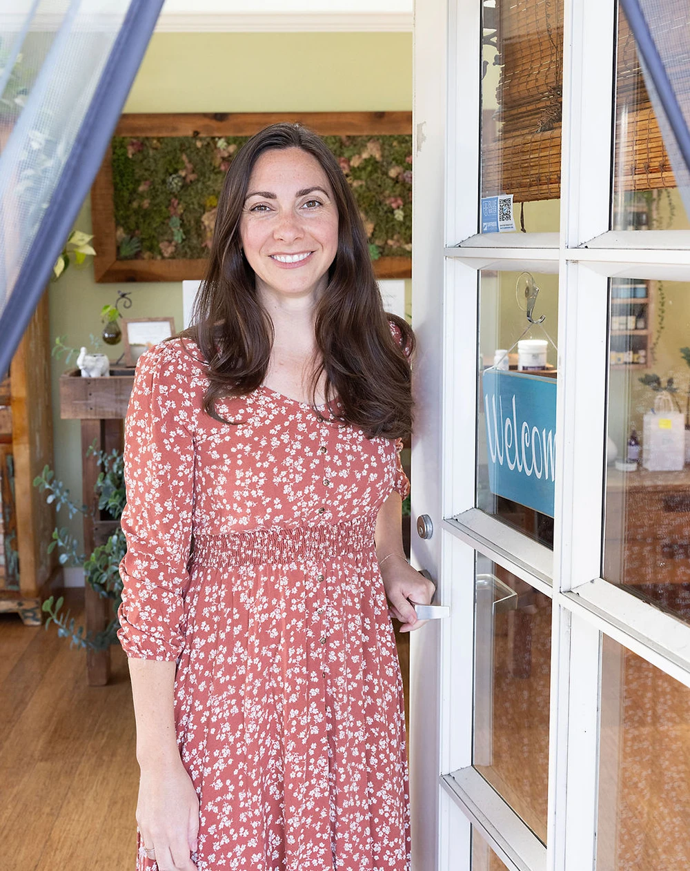 Naturopath Pacifica CA Ashton Perroni HP 1 Ashton Perroni smiling in the front door.