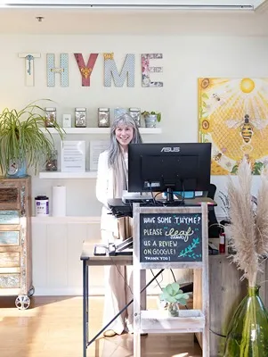 Naturopath Pacifica CA Front Desk Staff Smiling