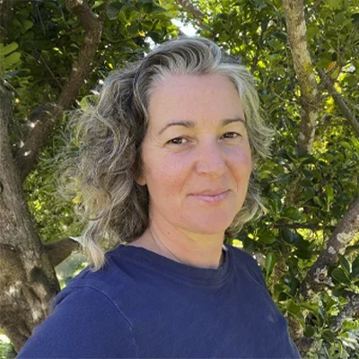 A headshot of Imogen Griffiths, a Certified Health & Life Coach and Energy Practitioner at Thyme Health.