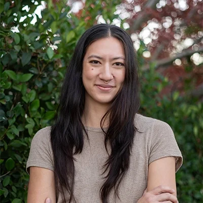 Tediana Torrens smiling outside.